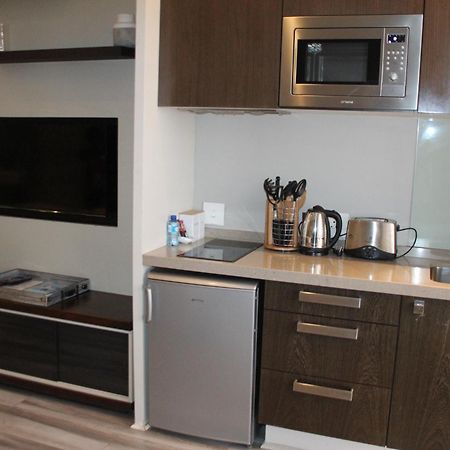 Sandton Skye Apartments Йоханнесбург Экстерьер фото
