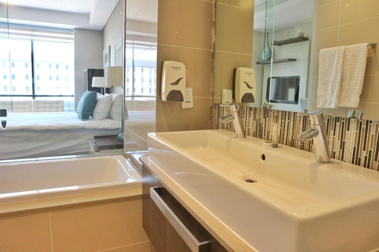 Sandton Skye Apartments Йоханнесбург Экстерьер фото