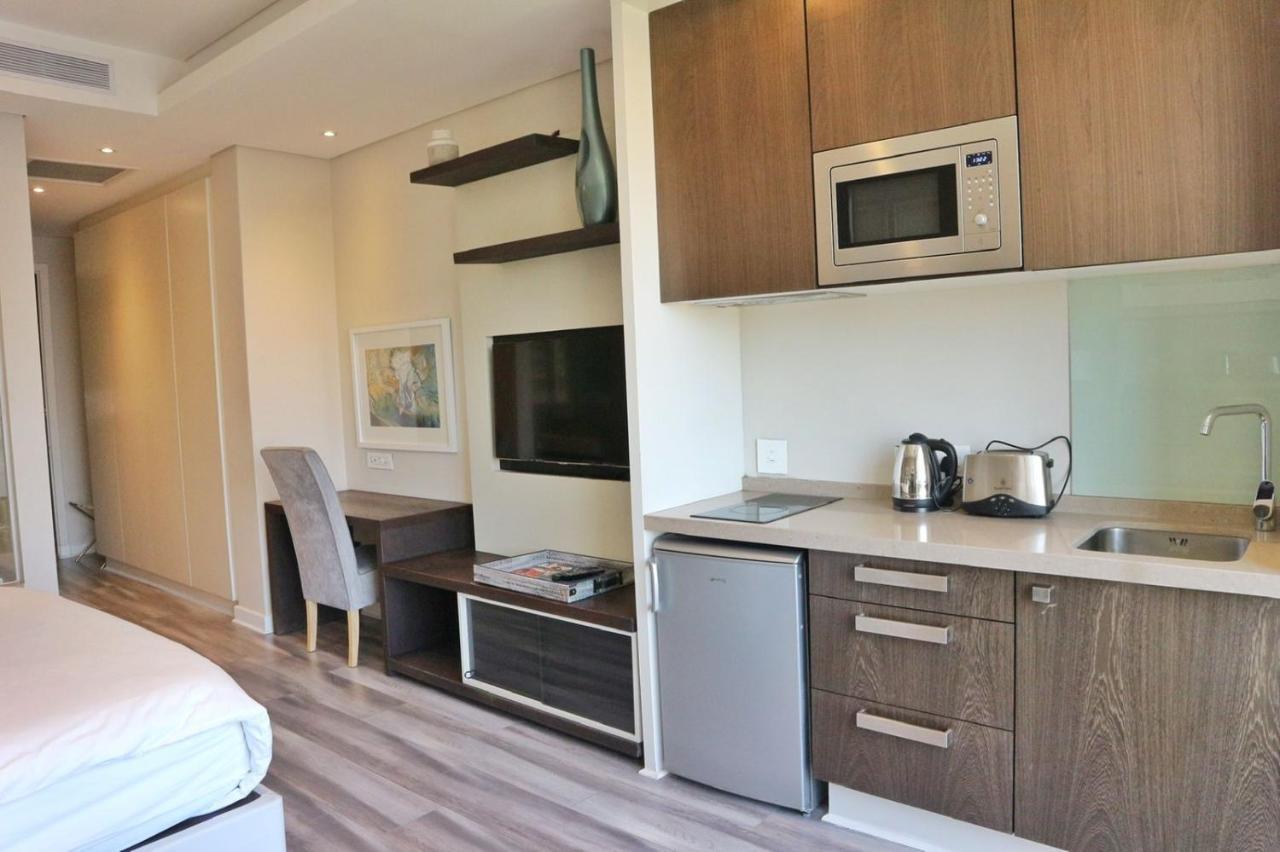 Sandton Skye Apartments Йоханнесбург Экстерьер фото