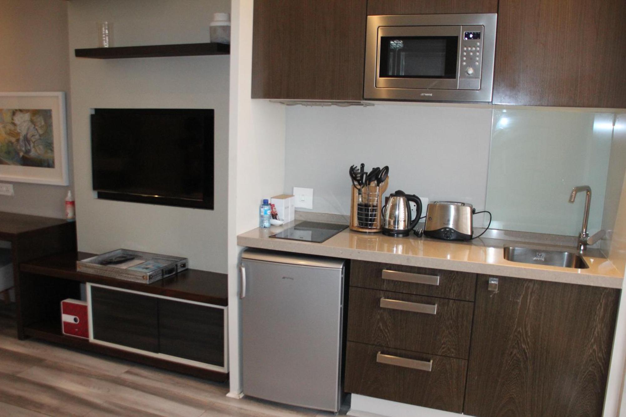 Sandton Skye Apartments Йоханнесбург Экстерьер фото