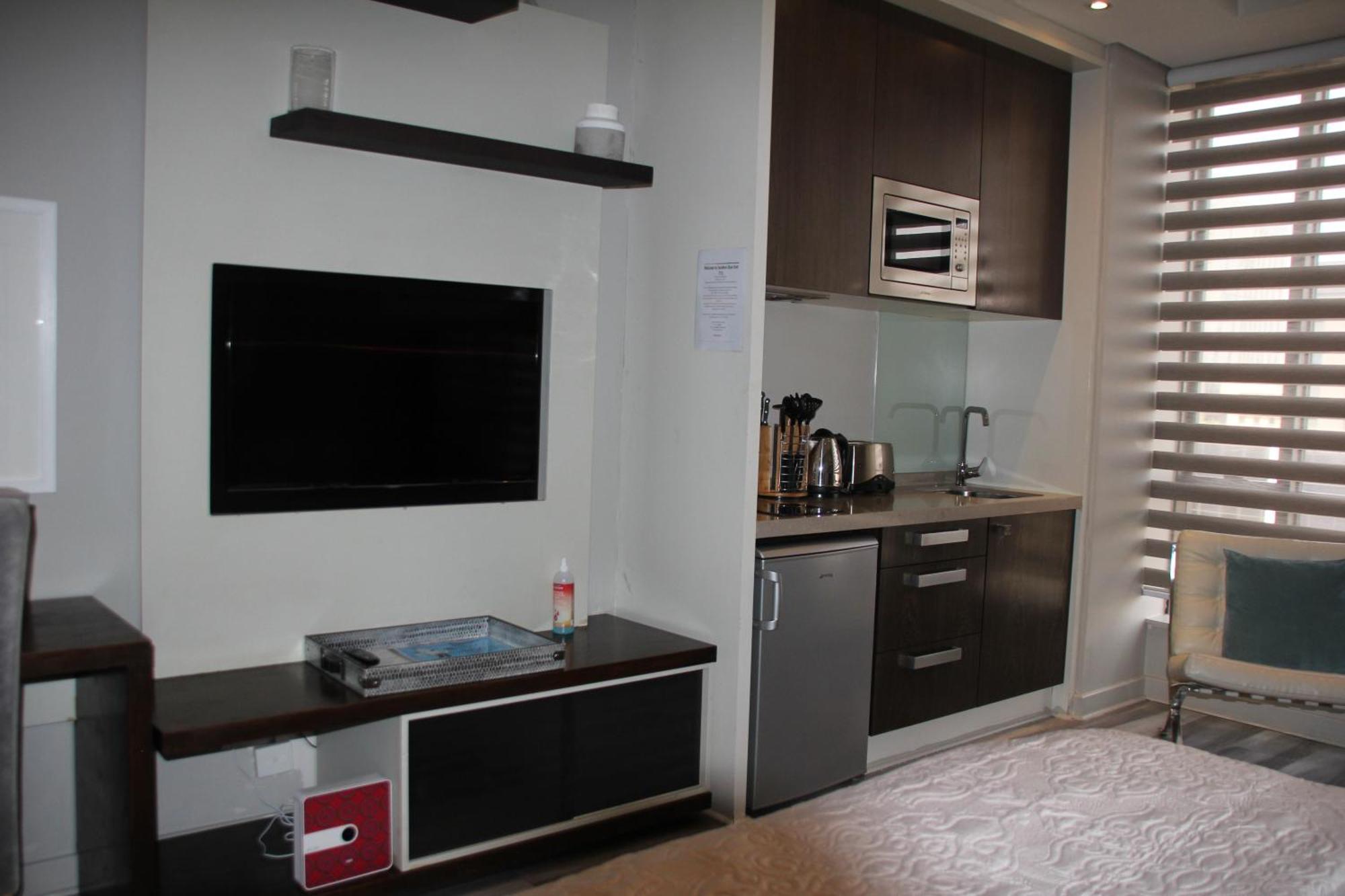 Sandton Skye Apartments Йоханнесбург Экстерьер фото